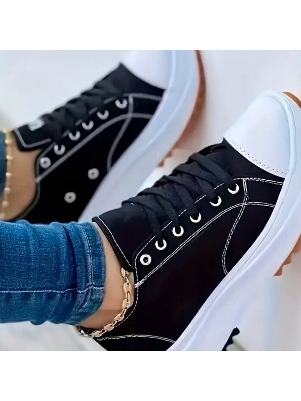 Women’s. Black canvas sneakers size 11 box y